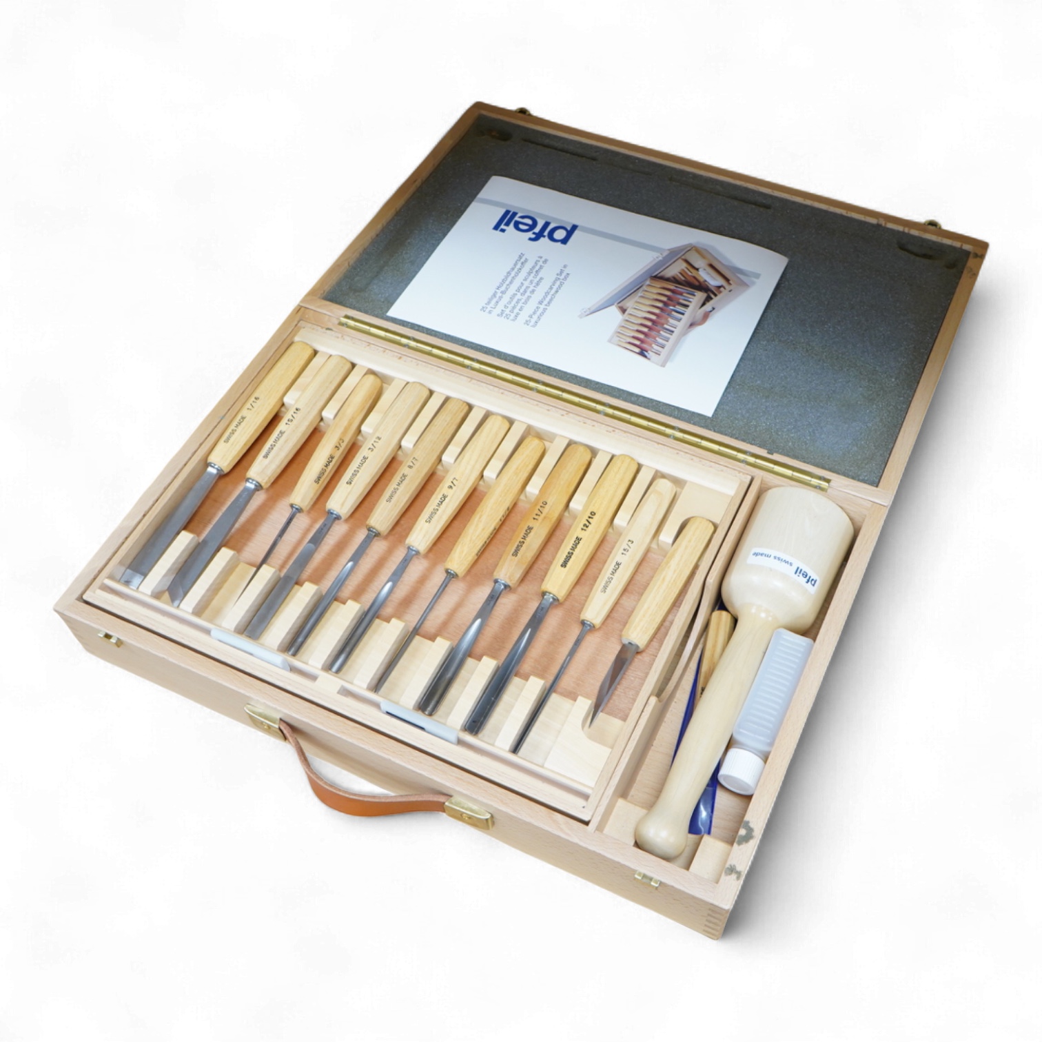 A Swiss made Pfeil 25-piece wood carving set, comprising; carving chisels, a mallet, sharpening stones, etc. contained within a fitted beech case, 530 x 330 x 95mm